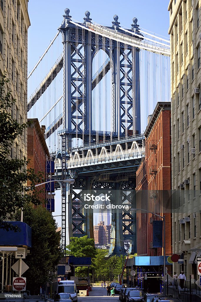 Street view of Manhattan Bridge "Manhattan Bridge and Empire State Building seen from Brooklyn, New York" Architecture Stock Photo