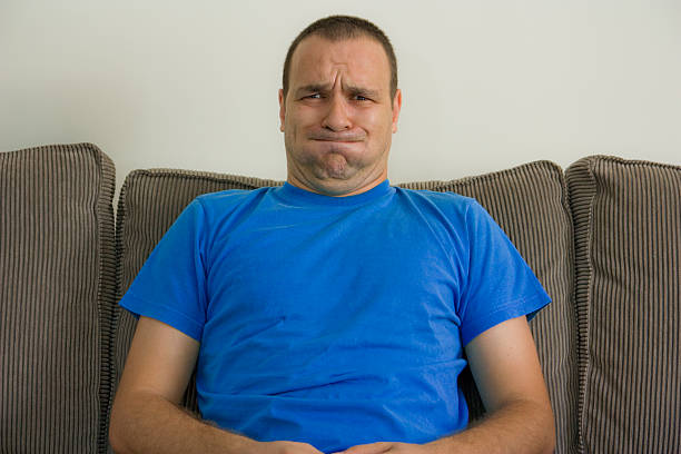 istock young man with weird facial expression 177401497