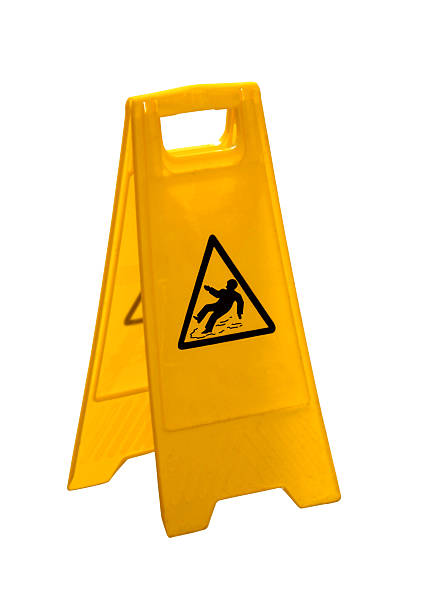 Slippery when wet Caution wet floor sign (isolated on white) hazard sign stock pictures, royalty-free photos & images