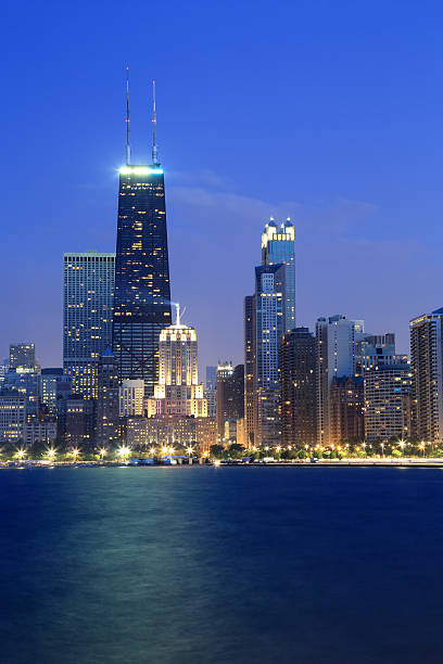 istock Chicago skyline at dusk from pier along Lake Michigan 177401887