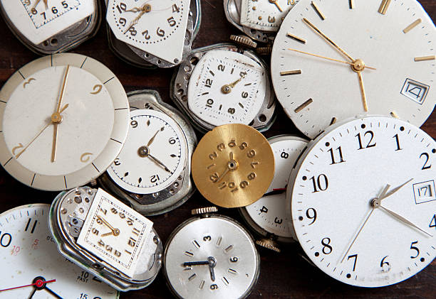 istock Assortment of old wrist watch faces on a wood background 177402000