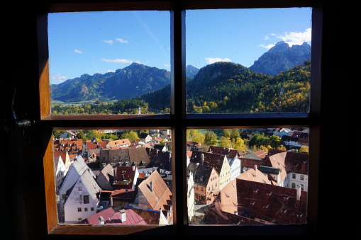 View from the window of the city of Fussen. Sunny weather in the city of Fussen. Autumn Fussen, view from the window.