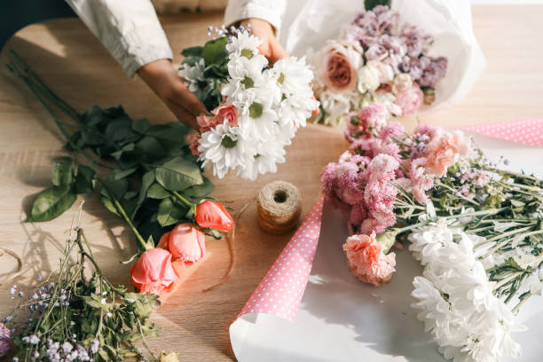istock Florist at work. Woman making autumn floral decorations 1774033465