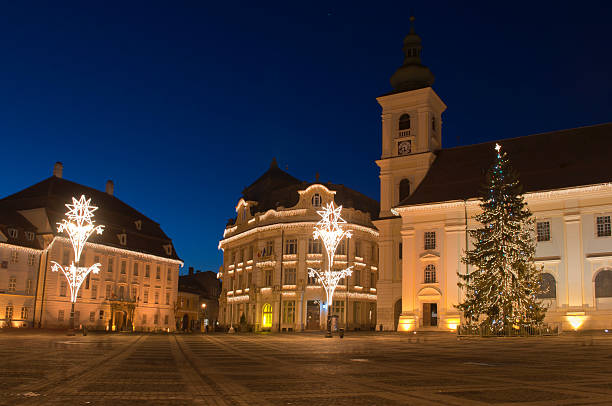 istock Christmas tree and lights in old town square 177403769