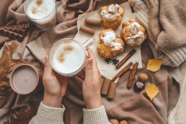 istock Cup of coffee in hands, cozy autumn 1774040114