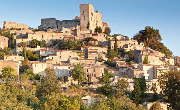 "The hill top village of Lacoste in Provence, including the ruins of ChAteau de Lacoste."