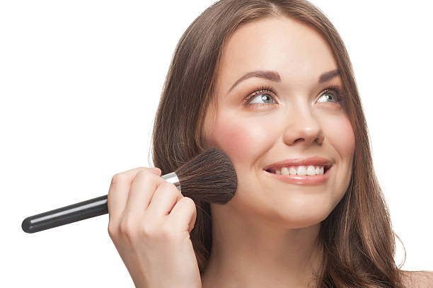 istock Pretty woman applying makeup 177405401