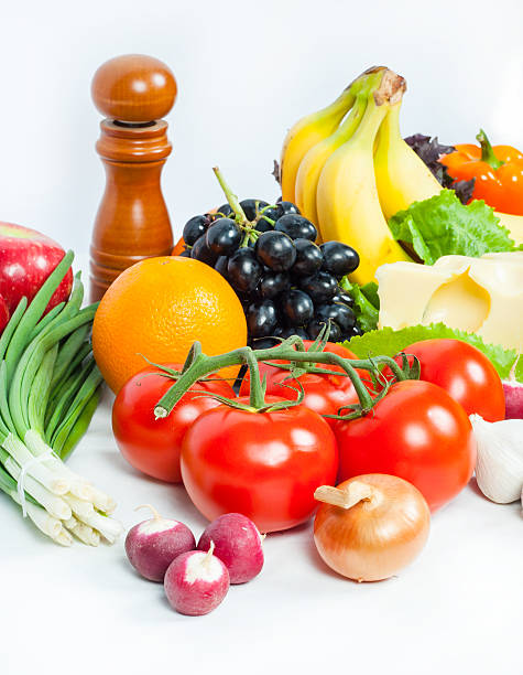 istock Fresh vegetables and fruits on white 177406180