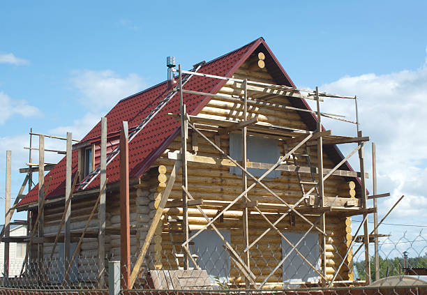 istock Wooden house construction in countryside 177406927