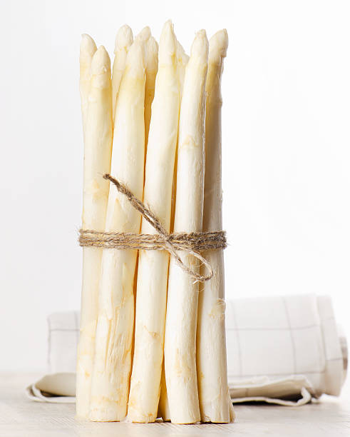 istock white asparagus on wooden table 177407068