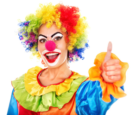 Portrait of clown with makeup thumb up.