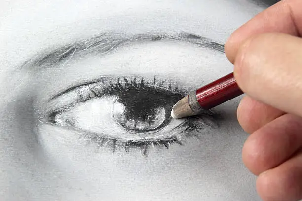 Photo of Drawing a portrait - eye close up