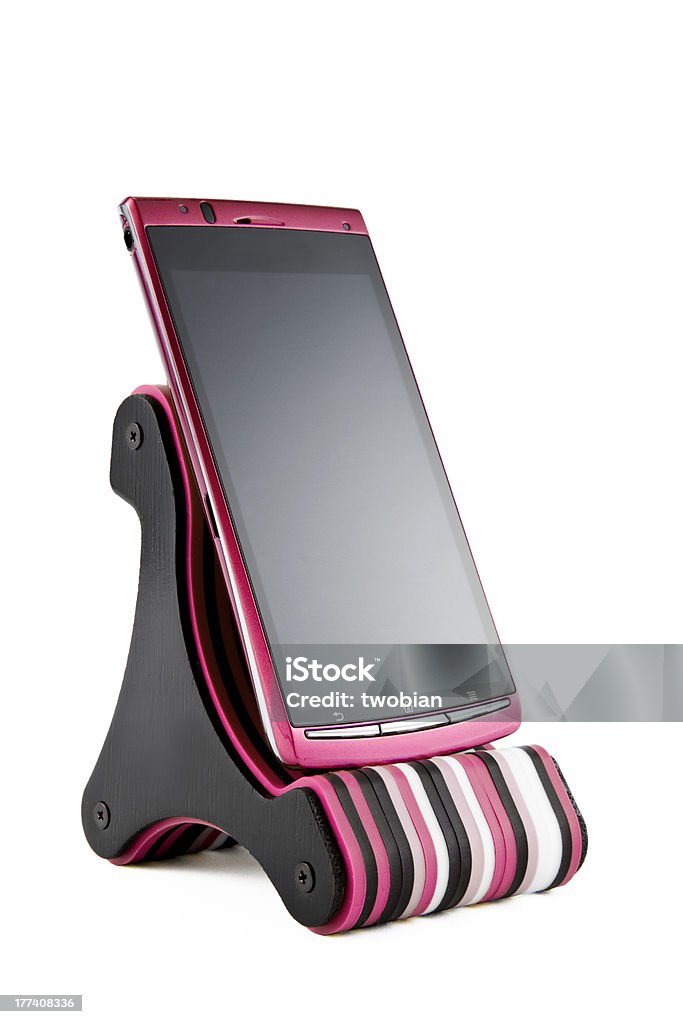 Lo smart phone su una base - Foto stock royalty-free di Affari