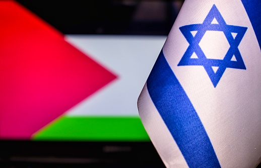 Israeli flag against the background of Palestine, war conflict between states