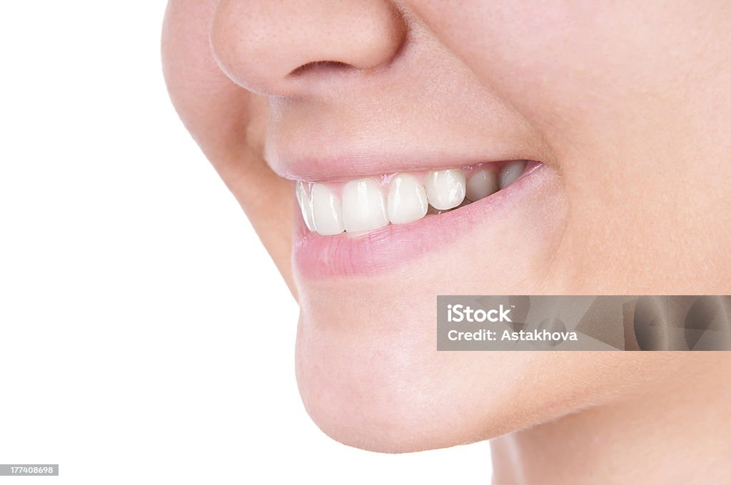 Wybielanie zębów. Opiekę jamy ustnej - Zbiór zdjęć royalty-free (Biały)