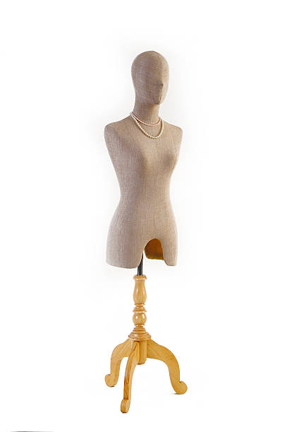 istock female mannequin  on  wooden rack 177409109