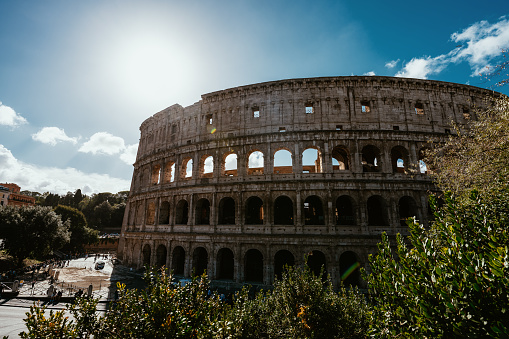 Panoramic cityscape of the Colosseum (Flavian Amphitheatre) and Roman forum in Rome, Italy. It was constructed in the 1st century AD.