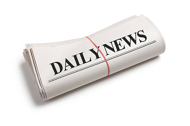 istock Daily News newspaper folded up on white background 177409542