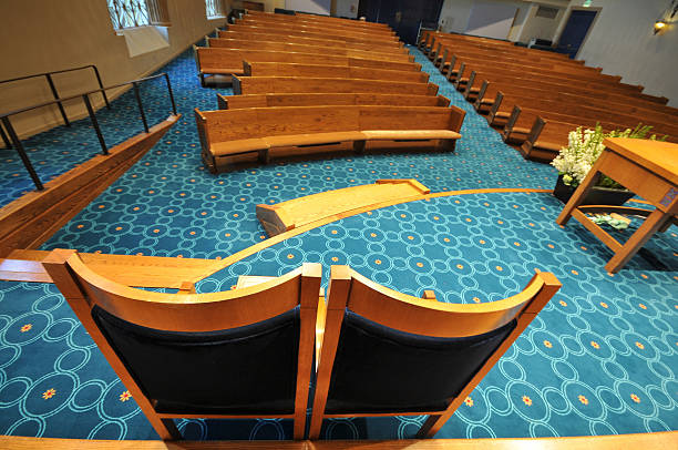 istock Rows of pews in a synagogue 177410934