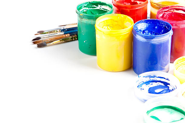 istock Jars of brightly coloured paint with brushes 177411218