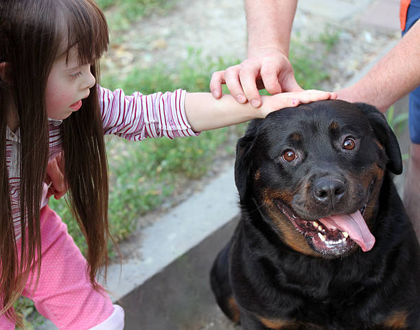 istock Little girl with a dog 177411457