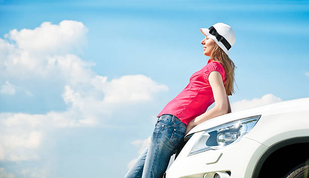 istock woman and her car 177411550