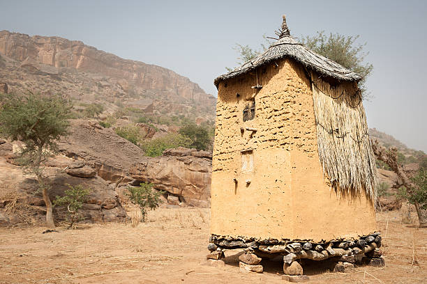 Granary in a Dogon village, Mali, Africa. "The Dogon are best known for their mythology, their mask dances, wooden sculpture and their architecture." granary stock pictures, royalty-free photos & images