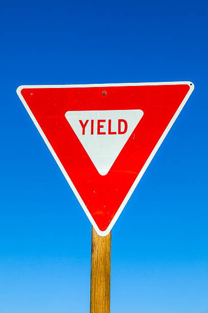 istock yield Sign at the highway with blue sky 177411713