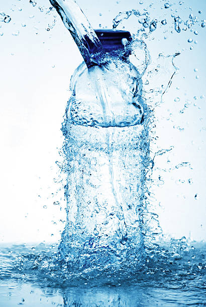 istock Water splash out of glass 177412257