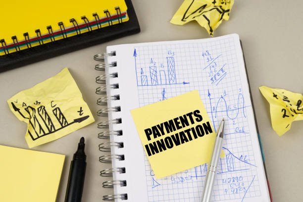 istock On the table there is a notepad with notes and sticky notes with the inscription - Payments innovation 1774131731