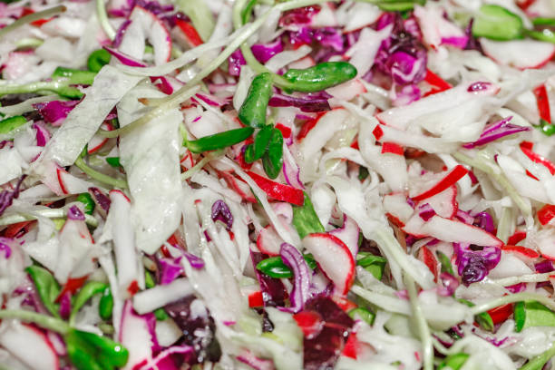 istock Cabbage radish onion and greens salad, close-up, selective focus 1774132038
