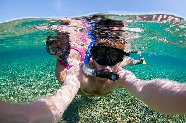 istock Couple Snorkelling over coral reef in Bali 177413751