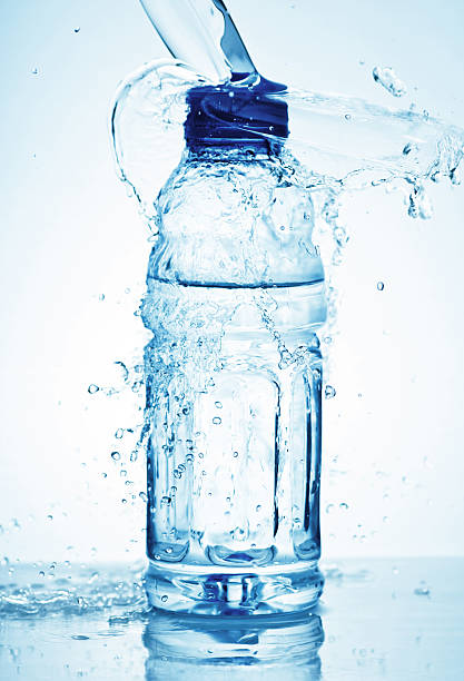 istock Water splash out of glass 177413812