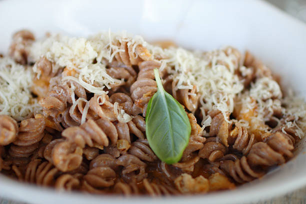 pasta with chicken meat and cheese stock photo