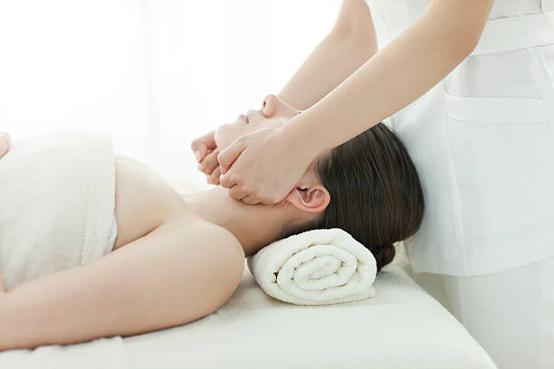 istock The beautician who massages a face 177414036