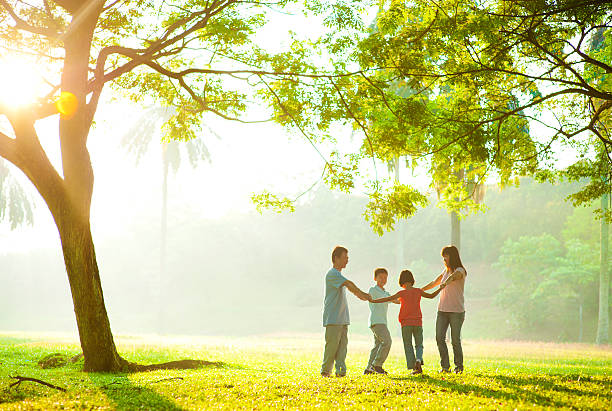 istock Happy Asian family holding hands in a circle 177414294