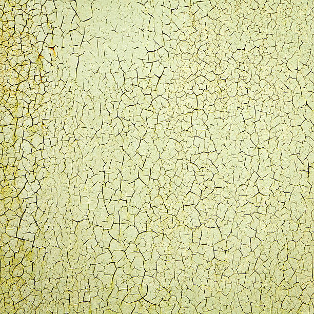 Detail of cracked paint on wall. stock photo