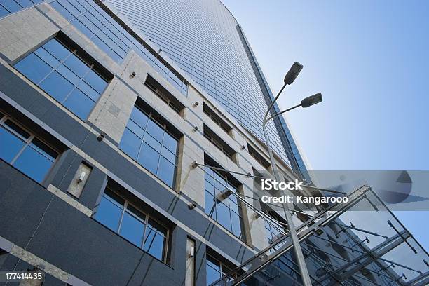 Skyscraper Facade And Street Lamp Stock Photo - Download Image Now - Architecture, Blue, Building Exterior