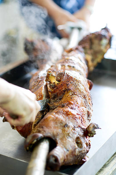 Spit roasted pig stock photo