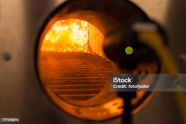 Wood Chips In A Furnace Stock Photo - Download Image Now - Biomass - Renewable Energy Source, Furnace, Boiler