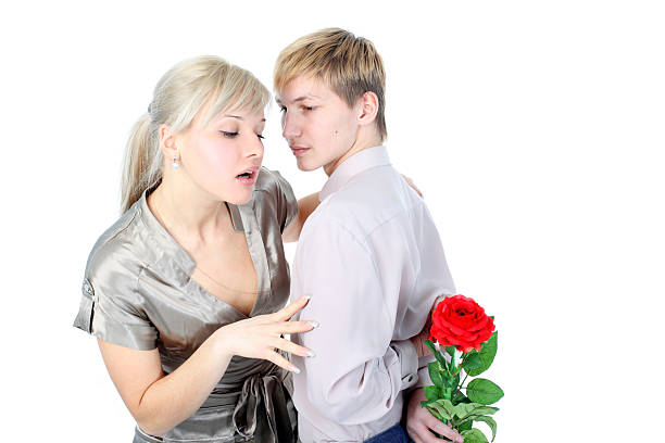 istock couple with gift and flower isolated on white 177414927