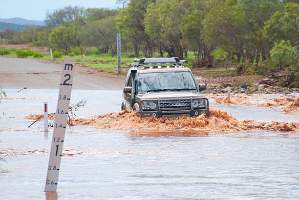 istock 4WD crossing flooded road 177415216
