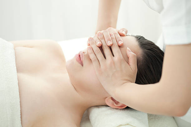 istock The beautician who massages a face 177416029