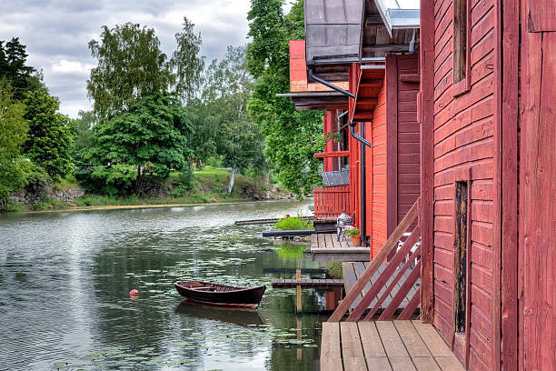 istock Red wooden buildings by a river 177416051