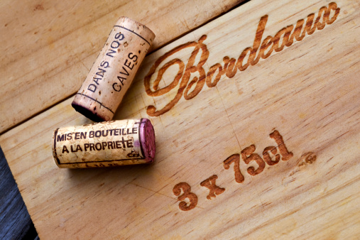 Wooden box of Bordeaux wines and corks