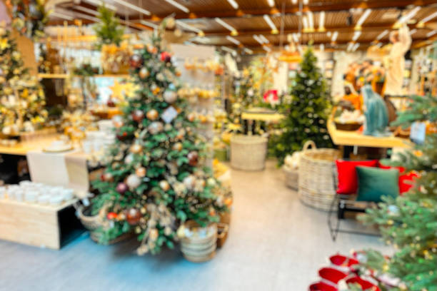 Blurry background of Christmas decorations in store stock photo