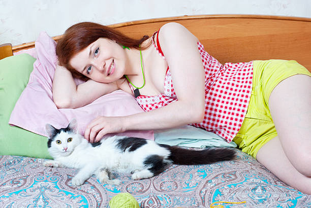 Girl with kitten stock photo