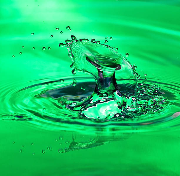 istock Two water drops meeting in mid-air 177416866