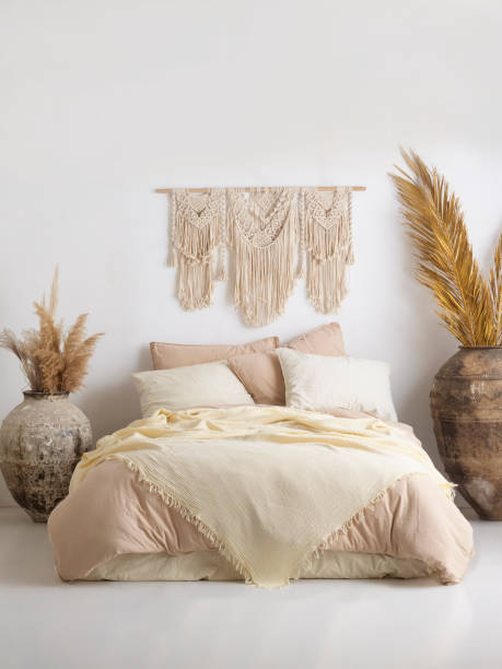 istock Wooden framed comfortable bed with many pillows, blanket 1774170089