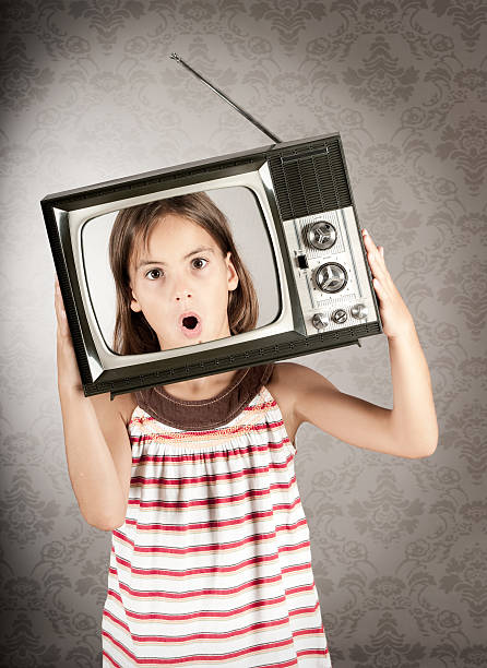 istock girl with television on her head 177417352
